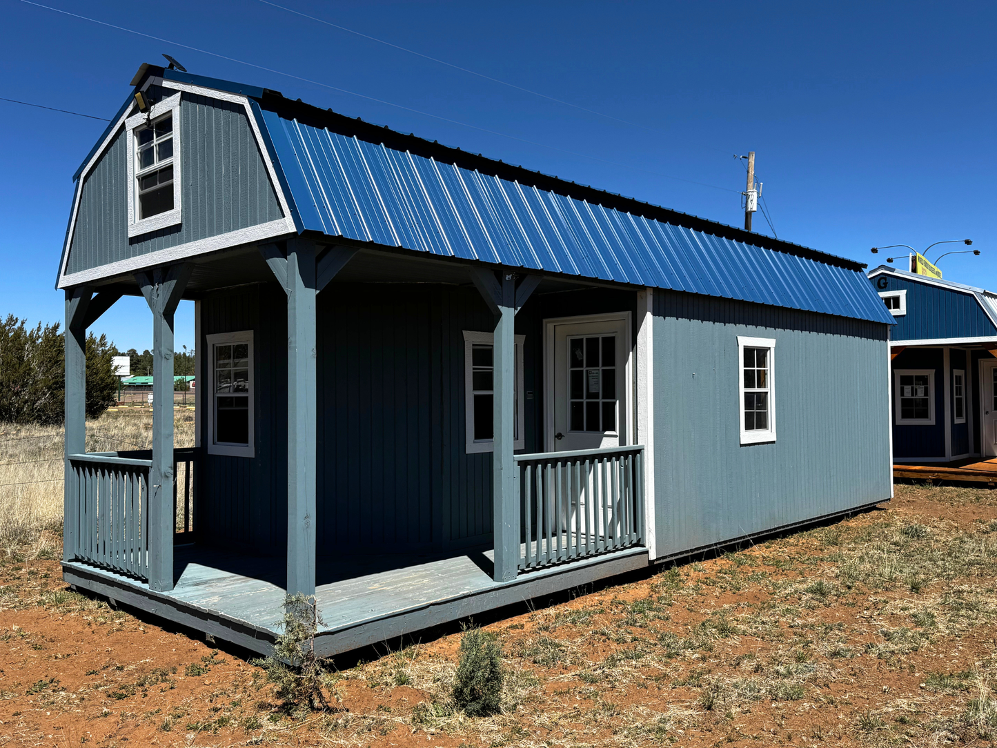 12 x 32 (PRE-OWNED) WRAPAROUND LOFTED BARN CABIN (RTO) LOW AS 587.07 A MONTH